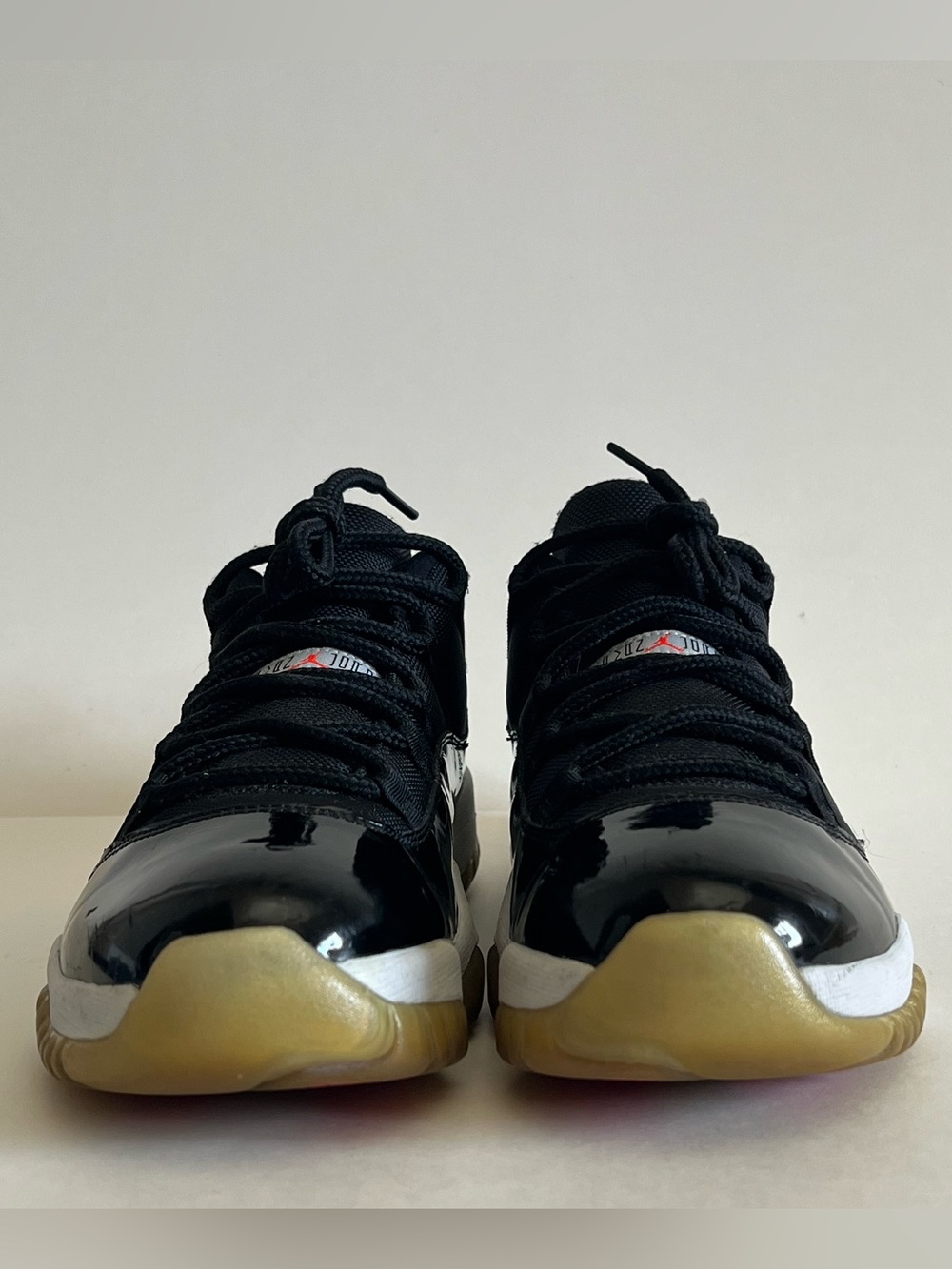Air Jordan 11 Retro “INFRARED 23” Black Patent Leather Sneakers